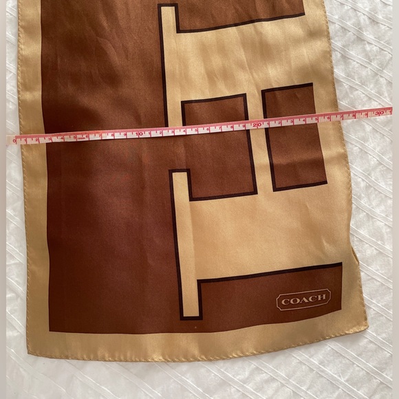 Coach silk scarf. Tan and brown logo print. Great condition. - Picture 8 of 8
